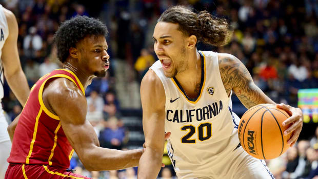 Cal's Jaylon Tyson drives on USC defender